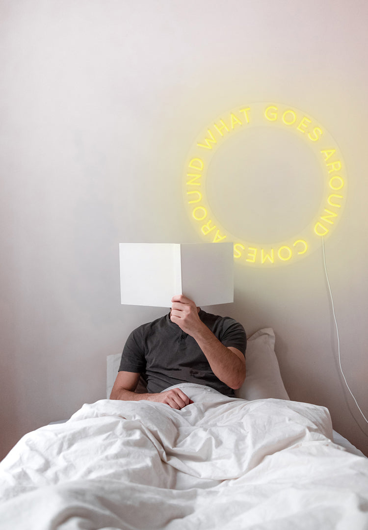 "What Goes Around Comes Around" Neon Sign